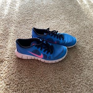Blue Nike running shoes